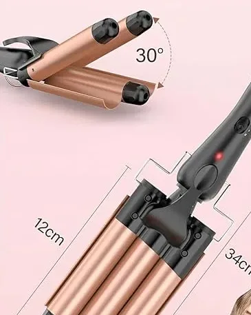 قياسات مكواة التمويج: طول 34 سم وعرض 12 سم وارتفاع 10 سم